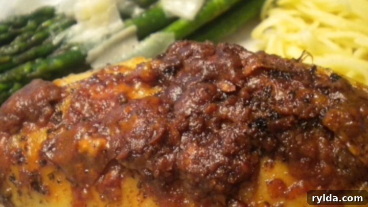 Chicken Savoy, a classic Italian-American chicken dish with rich sauce and cheese.