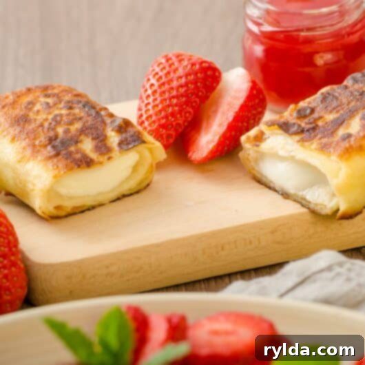 Golden Sweet Blintzes 2 Delicious Homemade Cheese Blintzes with fresh berries and sour cream