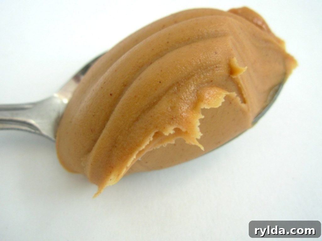 A jar of smooth, creamy peanut butter, perfect for baking fudgy brownies.