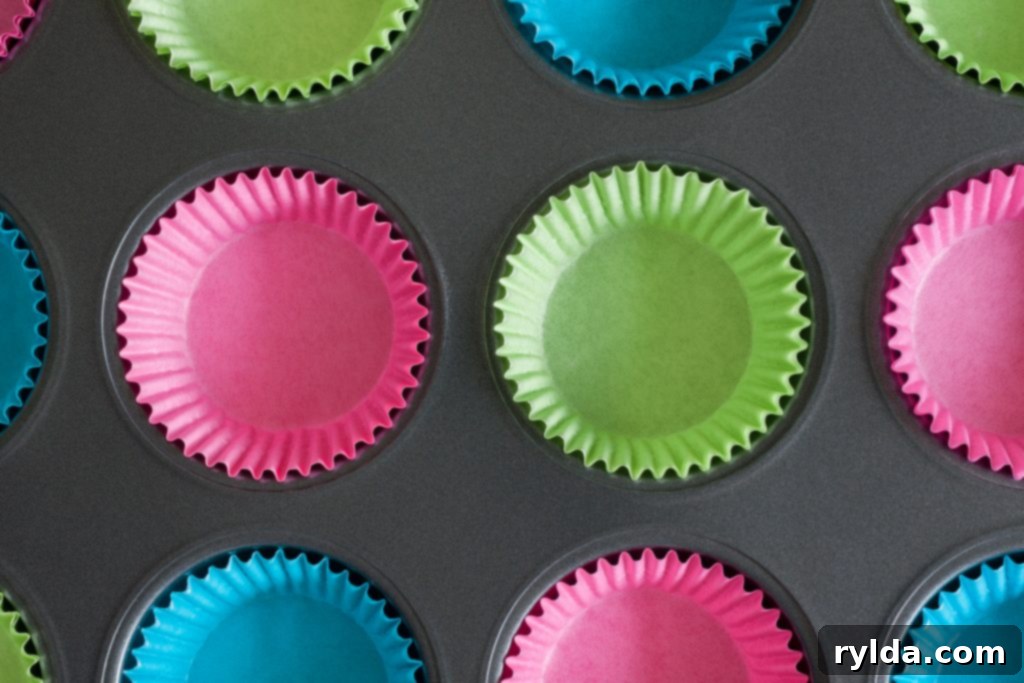Muffin tin with paper cupcake liners.