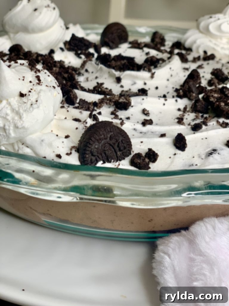 Decadent No-Bake Oreo Chocolate Delight 4 Close up of No-Bake Oreo Chocolate Pie with layers visible