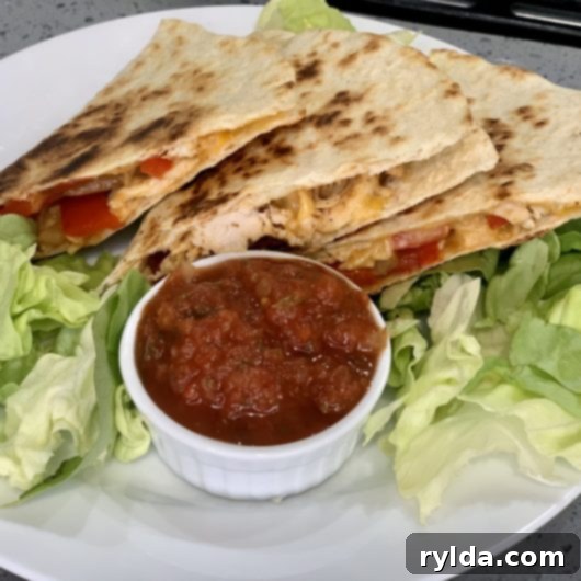 Perfectly Golden Cheesy Chicken Quesadillas
