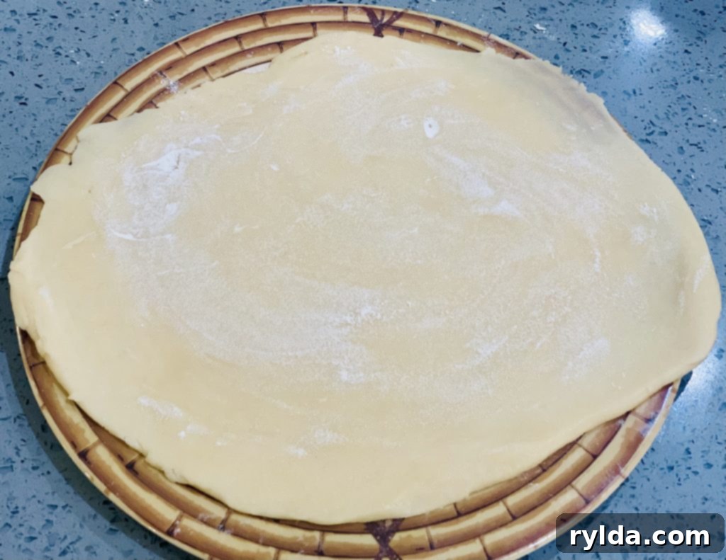 Rolled out and floured sugar cookie dough