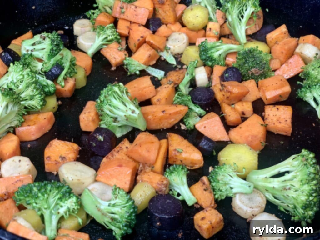 A finished grain bowl with various ingredients and dressing.
