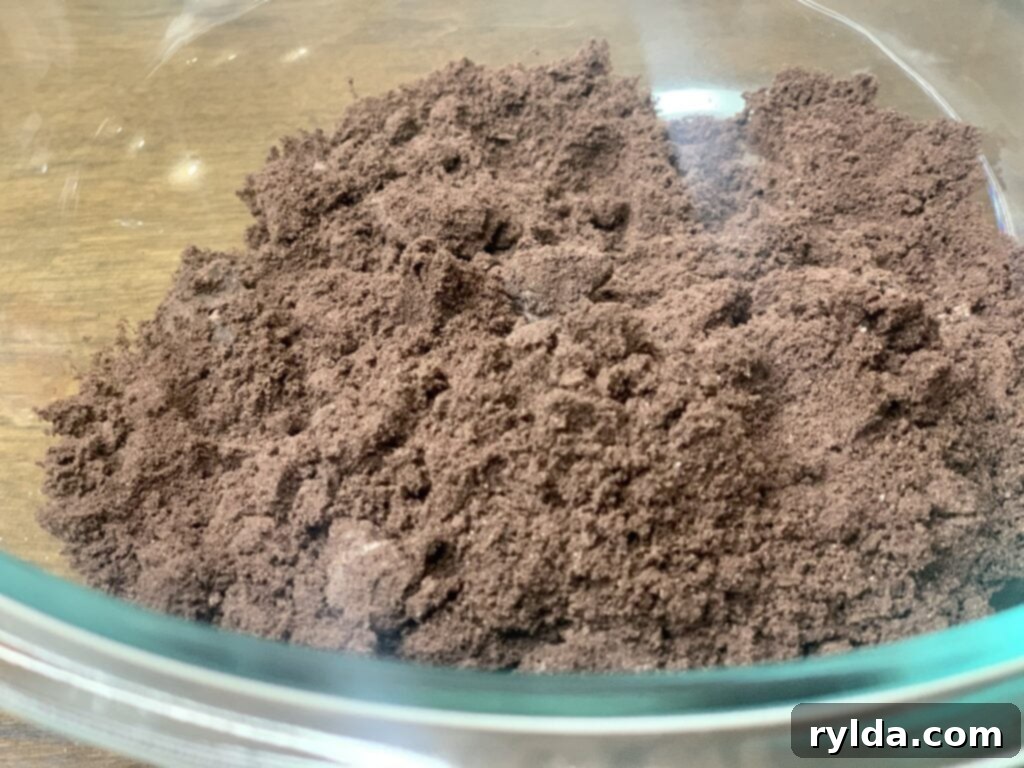 Chocolate sandwich cookies being blended for the crust