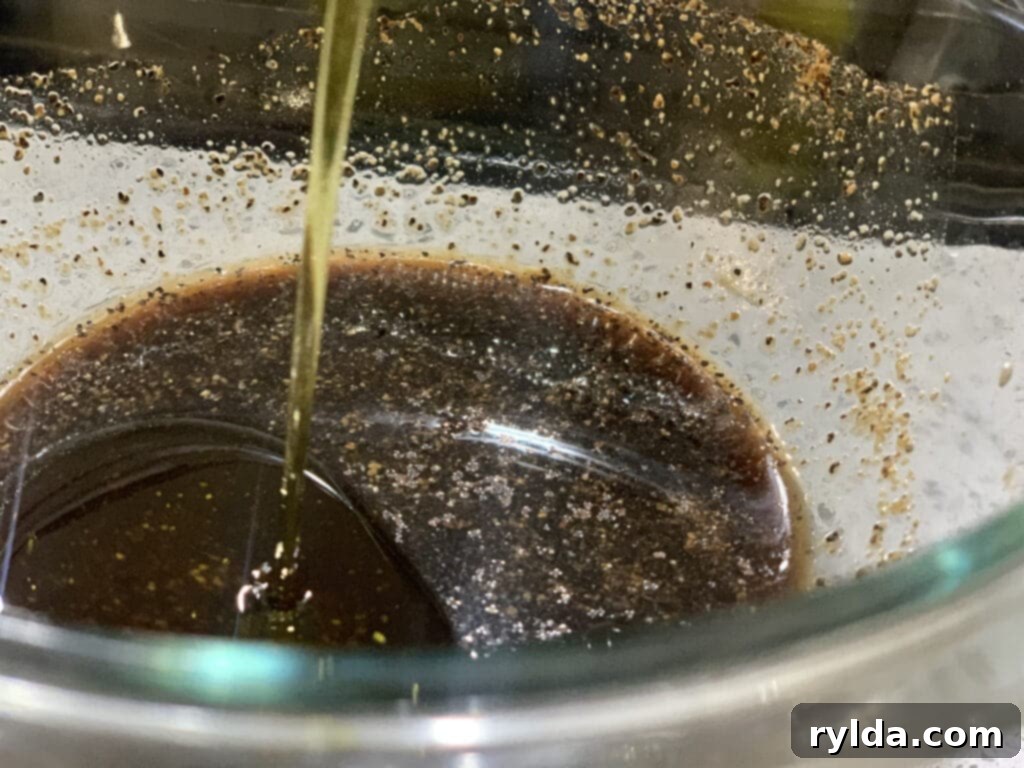 Bowl of sweet and savory marinade ingredients
