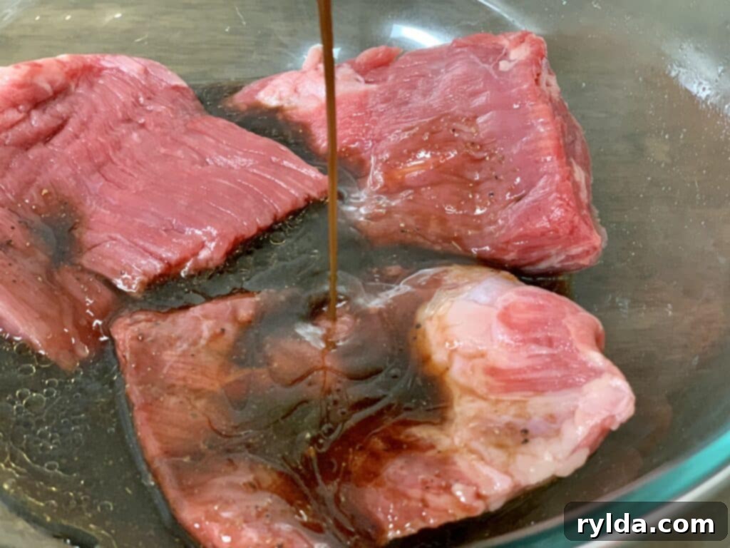 Flank steak coated in marinade, close-up