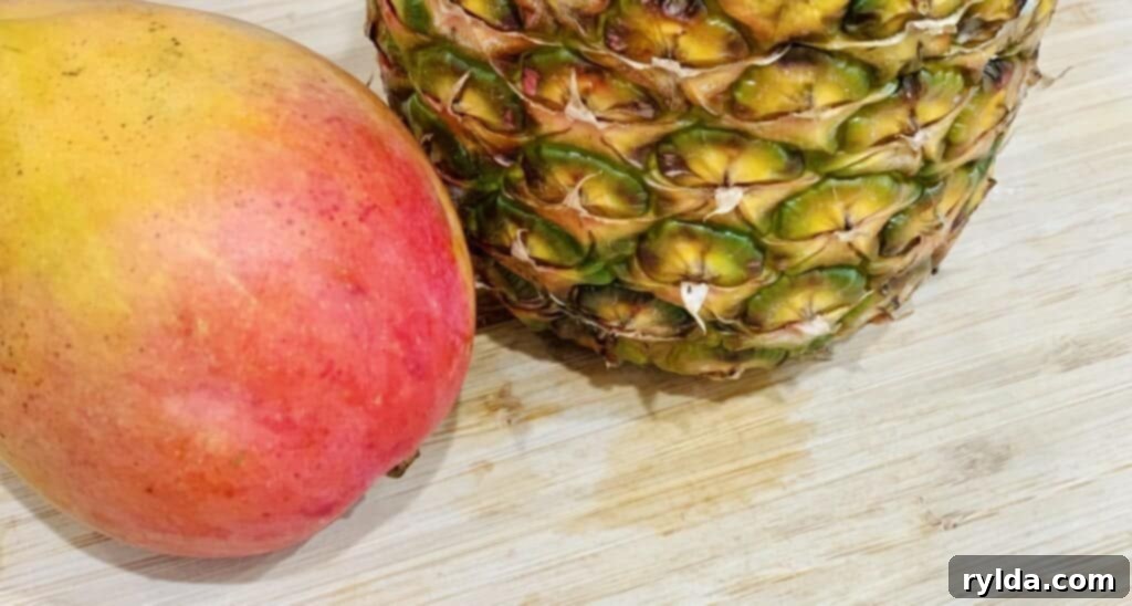 Two popsicles on a wooden board