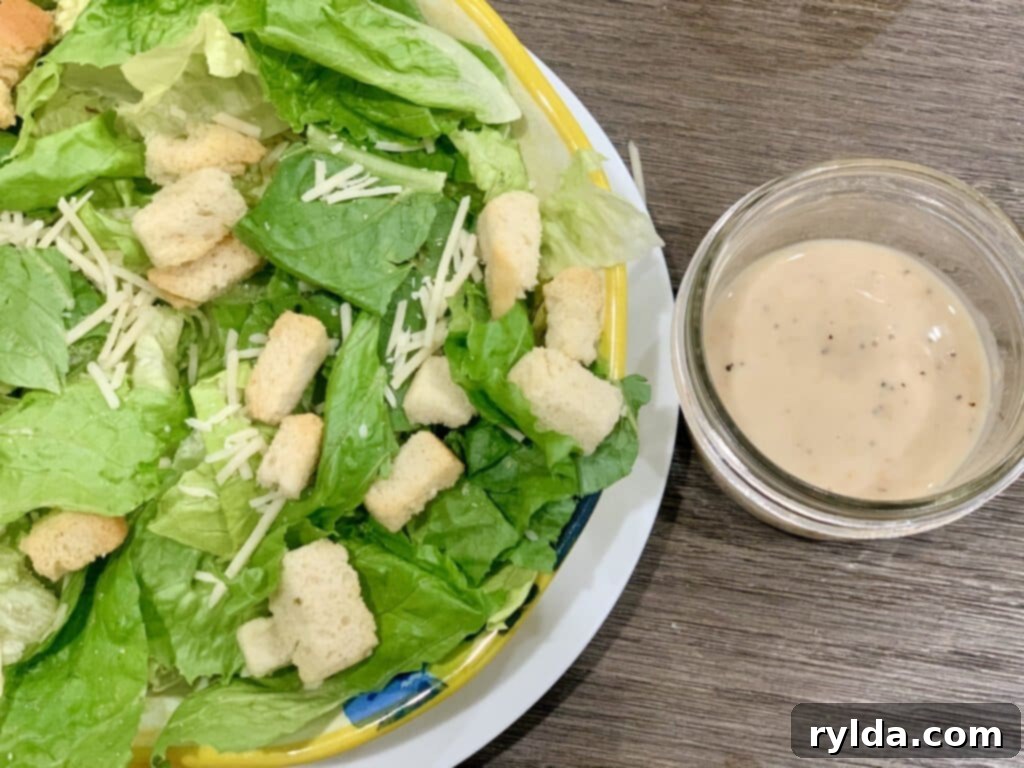 A fully assembled homemade Caesar Salad, ready to be served