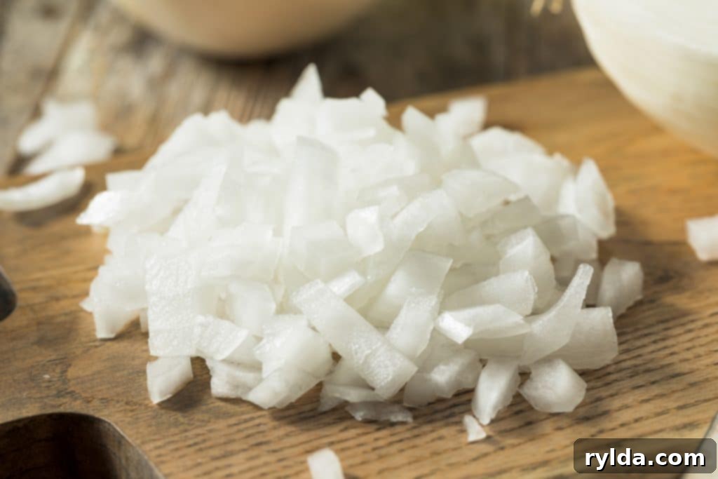 Freshly diced white onion, ready for cooking