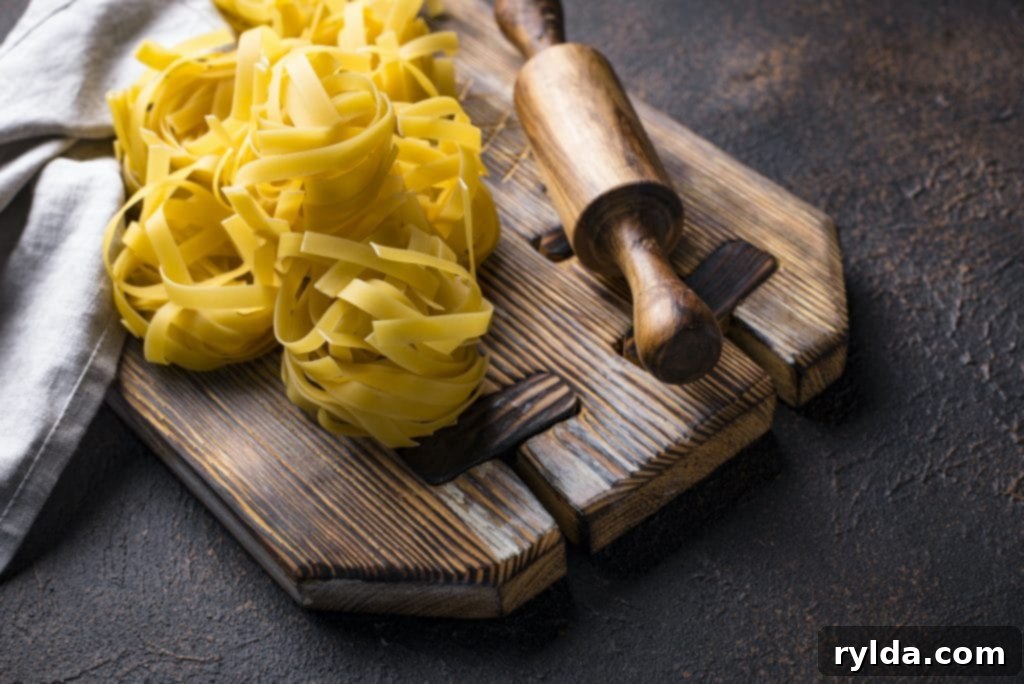 Milanese Creamy Chicken 4 Nests of fettuccine pasta, ready to be cooked for a delicious pasta dish.