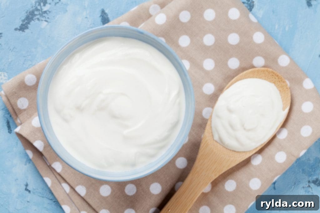 Creamy sour cream dollop, perfect for topping a savory casserole