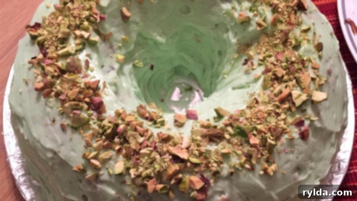 Pistachio Cake - a vibrant green cake with creamy frosting