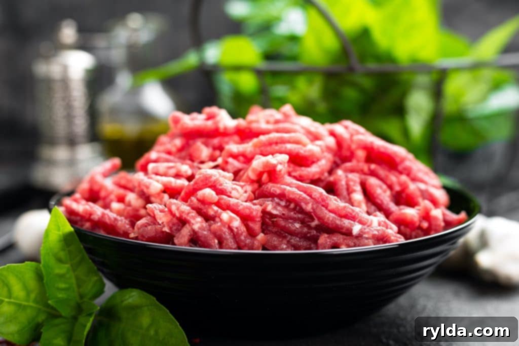 Quick and Delicious Glazed Meatloaf 2 Raw ground beef ready for meatloaf preparation.